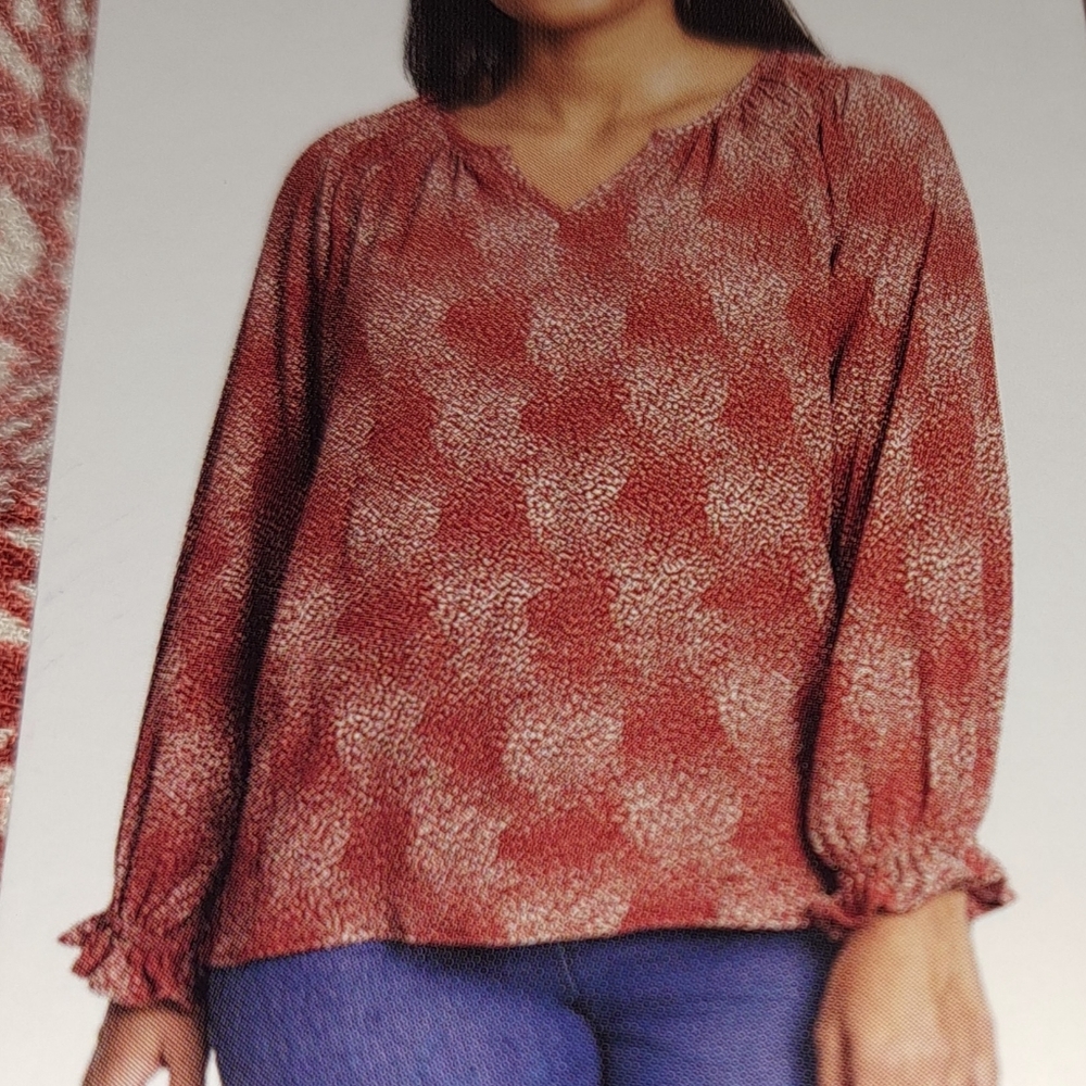 Jessica Simpson's woman's blouse size large.